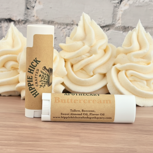 Buttercream-flavored lip balm with packaging on a wooden surface