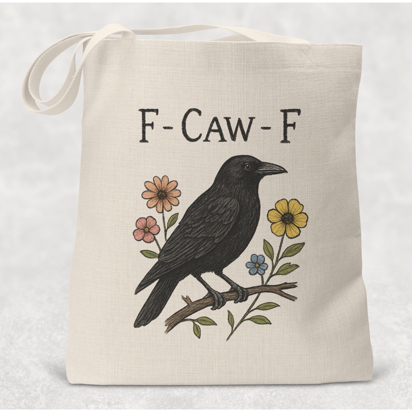 Tote bag with a crow illustration and 'F-CAW-F' text on a white background
